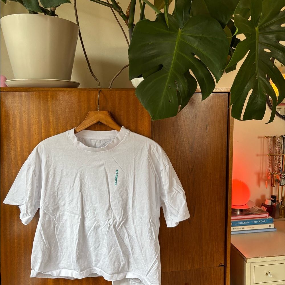 White Graphic Tee with Small Teal Climbing Gym Print
